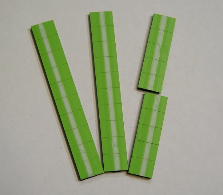 Satz Kippmagnete für Zusatzpläne, hellgrün mit Streifen